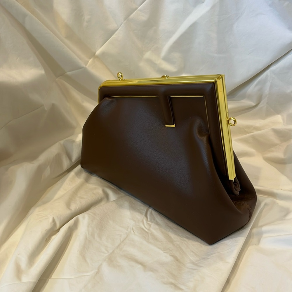 Leather snap-closed purse. New w/o tags